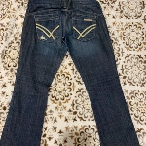 Woman’s bootcut jeans.